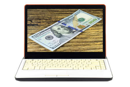 Laptop show dollars.の写真素材