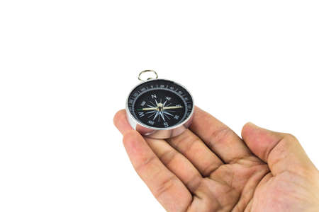Human Hand Holding Compass Navigation Direction.の写真素材