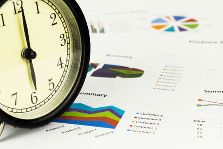 Alarm clock, Calculations, savings, finances and analysis of the market concept.の写真素材