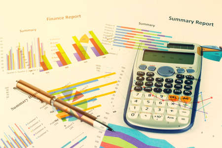 Double exposure of calculator savings with economy concept background.の写真素材
