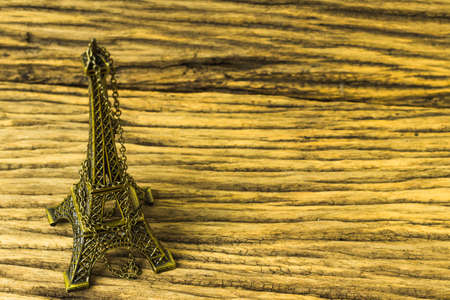 Eiffel tower replica on wooden background.の写真素材