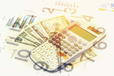 Double exposure of Business graph, money and clock for finance and banking concept.の写真素材