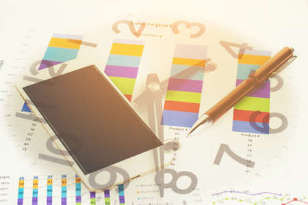 Double exposure of Business graph and clock for finance and banking concept.の写真素材