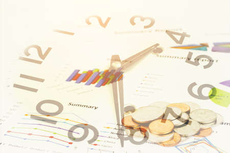 Double exposure of Business graph and clock for finance and banking conceptの写真素材