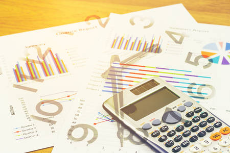Double exposure of Business graph and clock for finance and banking concept.の写真素材