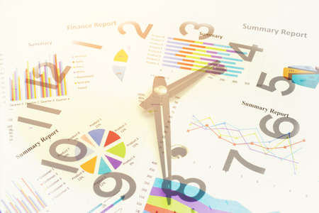 Double exposure of Business graph and clock for finance and banking concept.の写真素材