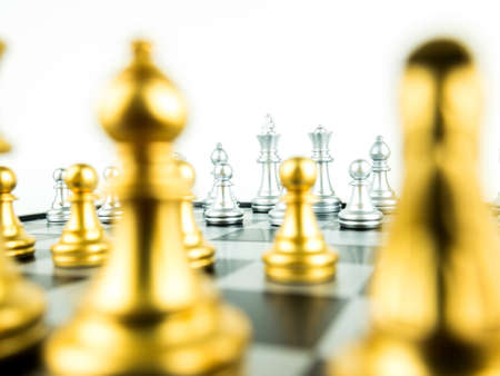 Gold and Silver King and Knight of chess setup on white background . Leader and teamwork concept for success. Chess concept save the king and save the strategy.の写真素材