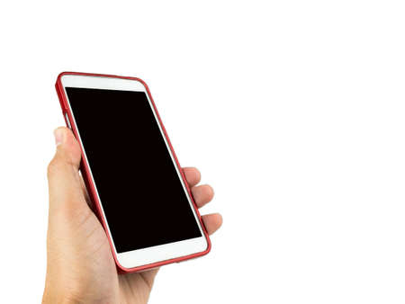 Hand holding smart phone isolated on white background with clipping path.の写真素材