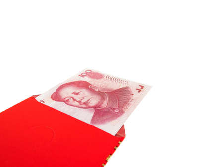 Chinese or 100 Yuan banknotes money in red envelope isolated on white background, as chinese new year background, Clipping path.の写真素材