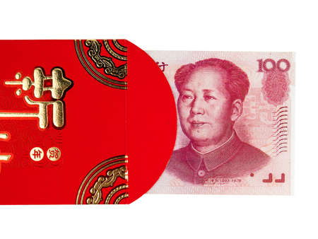 Chinese or 100 Yuan banknotes money in red envelope isolated on white background, Chinese text on envelope meaning Happy Chinese New Yearの写真素材