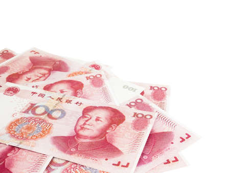 It is a lot of One hundred Yuan banknotes pile isolated on white  background, Chinese yuan Currencies, Clipping path.の写真素材