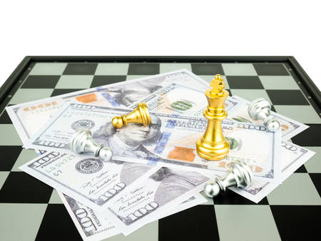 Gold King of chess on dollar banknote background, Business success concept.の写真素材