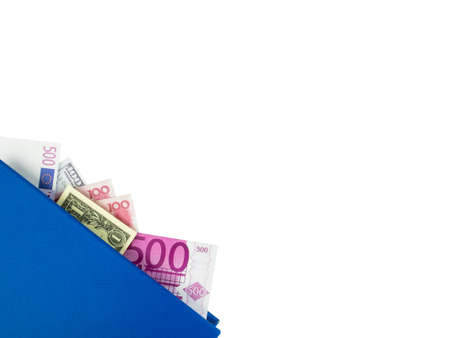 Blue book with nested international banknotes, isolated on white background. Stash of money concept, Business ideasの写真素材