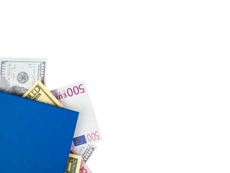 Blue book with nested international banknotes, isolated on white background. Stash of money concept, Business ideas, Clipping path.の写真素材
