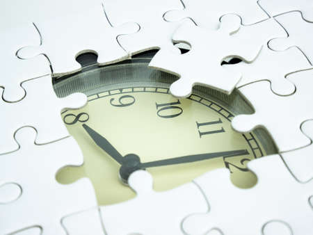 Missing jigsaw puzzle pieces on Alarm clock background, Business solution concept, Time for success concept.の写真素材