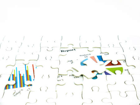 Missing jigsaw puzzle pieces on Graph Calculations background, Key for Business economic success...