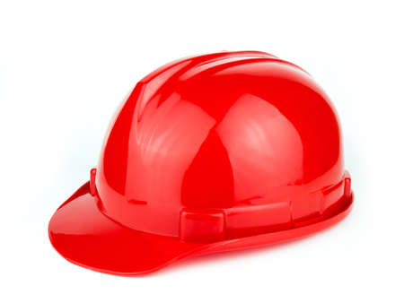 Red construction safety helmet isolated on white background.の写真素材