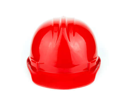 Red construction safety helmet isolated on white background.の写真素材