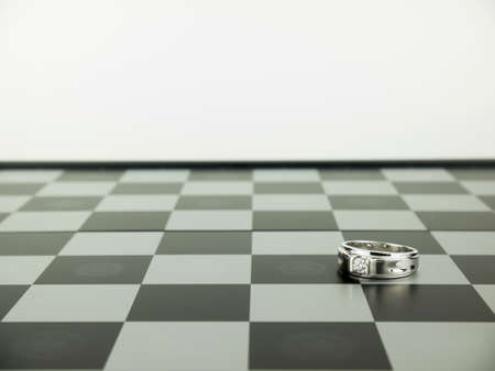 Diamond ring with chess board, Wedding Concept.の写真素材