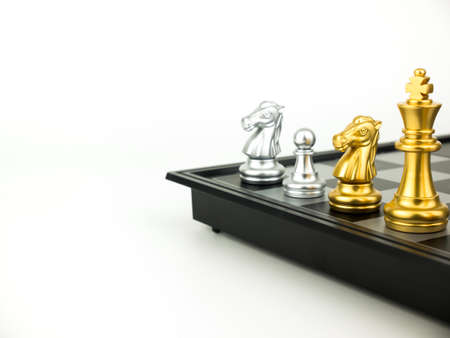 Gold and Silver King and Knight of chess piece setup on white background . Leader and teamwork concept for success.の写真素材