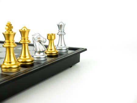 Gold and Silver King and Knight of chess piece setup on white background . Leader and teamwork concept for success.の写真素材
