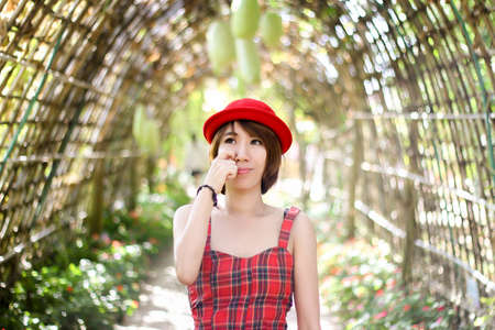 Portrait of Beauty young woman in the park.の写真素材