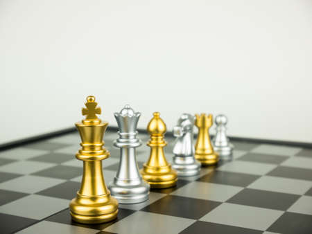 Gold and silver chess pieces.の写真素材