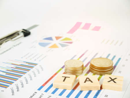 TAX concept with business graph analyst and sale report.の写真素材