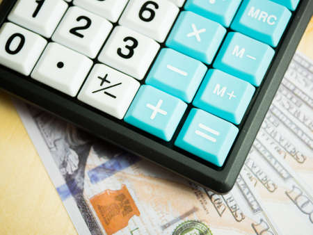 Business marketing graph and Financial analysis chart report  with calculator on dollar money.の写真素材