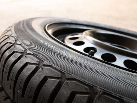 Old tire of car park on the street.の写真素材
