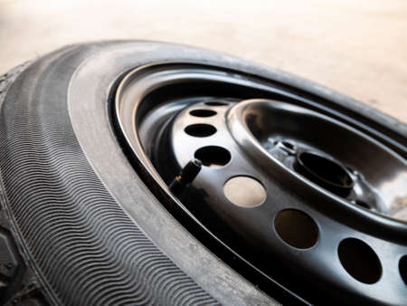 Old tire of car park on the street.の写真素材