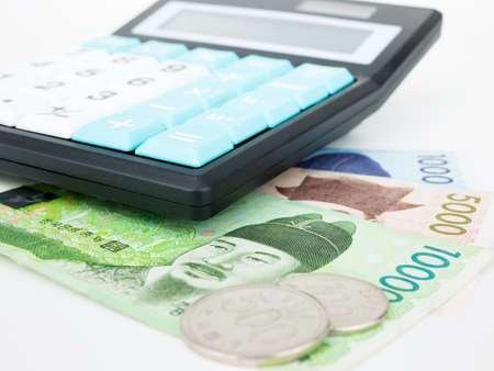 South Korea won banknote currency close up macro with calculator, Korean money.の写真素材