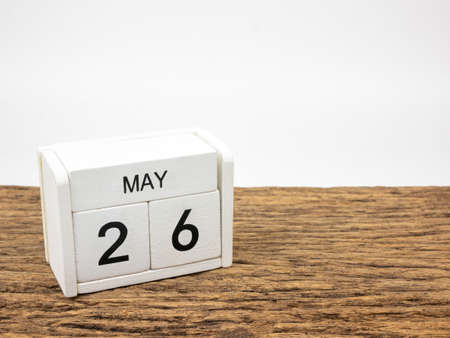 May 26 white wooden calendar on vintage wood and white background with Spring day, Copyspace for text.の写真素材