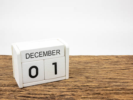 December 1 white cube wooden calendar on vintage wood and white background with winter day, Copyspace for text, World AIDS Day.の写真素材