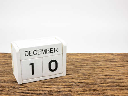 December 10 white cube wooden calendar on vintage wood and white background with winter day, Copyspace for text, Human Rights Day.の写真素材
