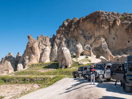 Cappadocia, Turkey - May 04, 2019: Jeep safari of travel cave town and rock formations.のeditorial素材