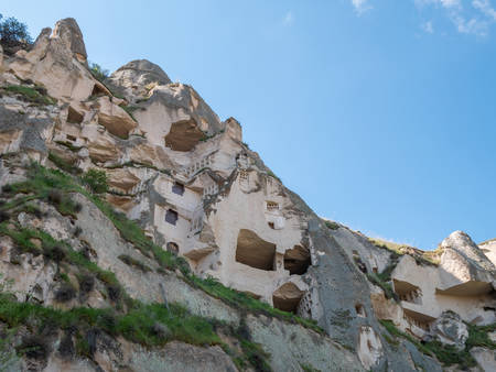 Cave town and rock formations in Zelve Valley, Cappadocia, Turkey.のeditorial素材