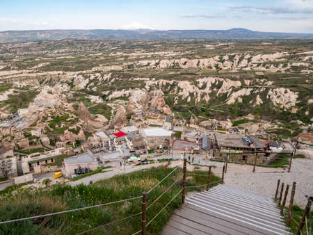 A view across the Cappadocia region of turkey from the Uchisar castle atop the small town in Turkey.の写真素材