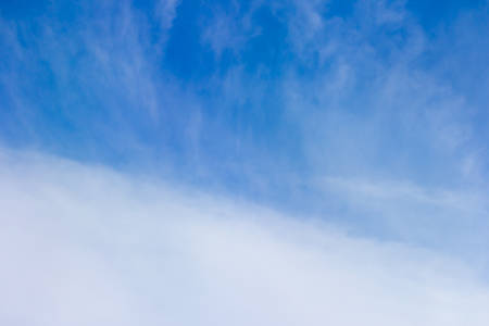 Beautiful blue sky with clouds background.の写真素材