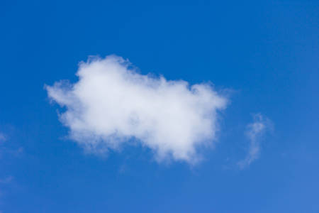Beautiful blue sky with clouds background.の写真素材