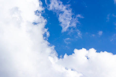 Beautiful blue sky with clouds background.の写真素材
