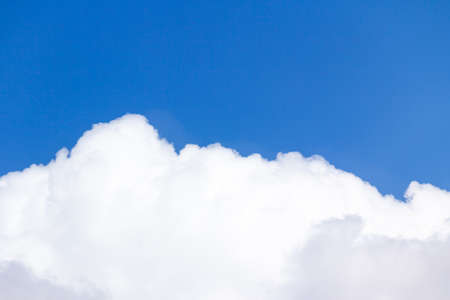 Beautiful blue sky with clouds background.の写真素材
