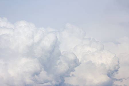 Beautiful blue sky with clouds background.の写真素材