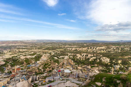 A view across the Cappadocia region of turkey from the Uchisar castle atop the small town in Turkey.の写真素材