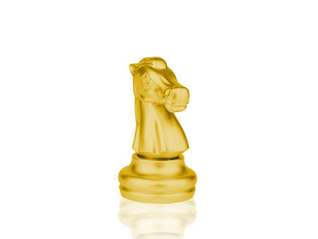 The gold Knight Chess pieces battle  on white backgroundの写真素材
