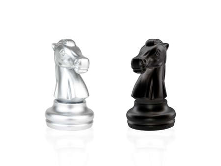 The Knight Chess pieces battle, black and silver isolated on white backgroundの写真素材