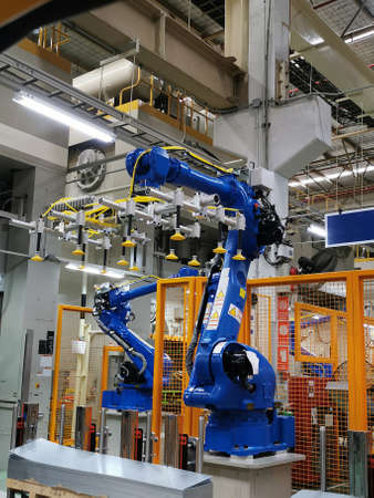 Industrial robot are test run process in assembly factory.の写真素材