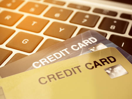 Credit card close up with keyboard, Shopping online concept.