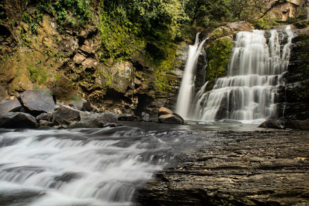 Amazing waterfall in Costa Rica with beautiful greens. Long exposure. Nauyaca Waterfall, Dominical,...
