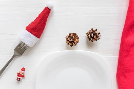 Christmas composition with Christmas tree. The form for the text of the New Year banner on a white wooden background. Collage with branches of natural needles. New Year's compositionの写真素材